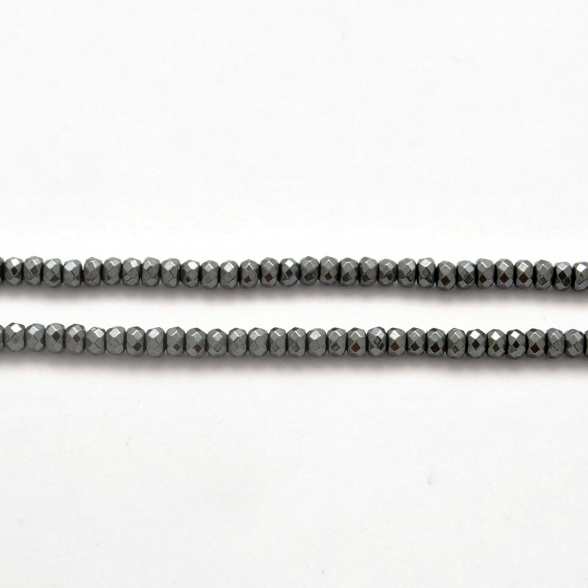 Hematite rondelle beads - close-up mirror metallic sheen detail