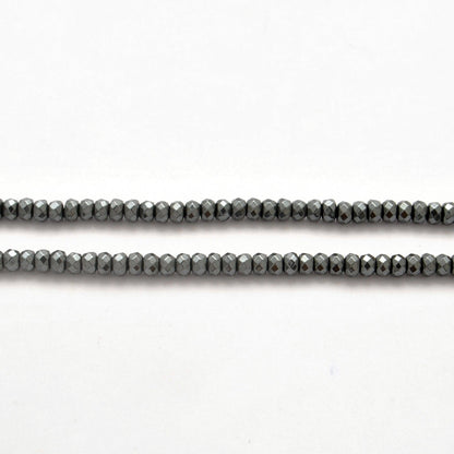 Hematite rondelle beads - close-up mirror metallic sheen detail