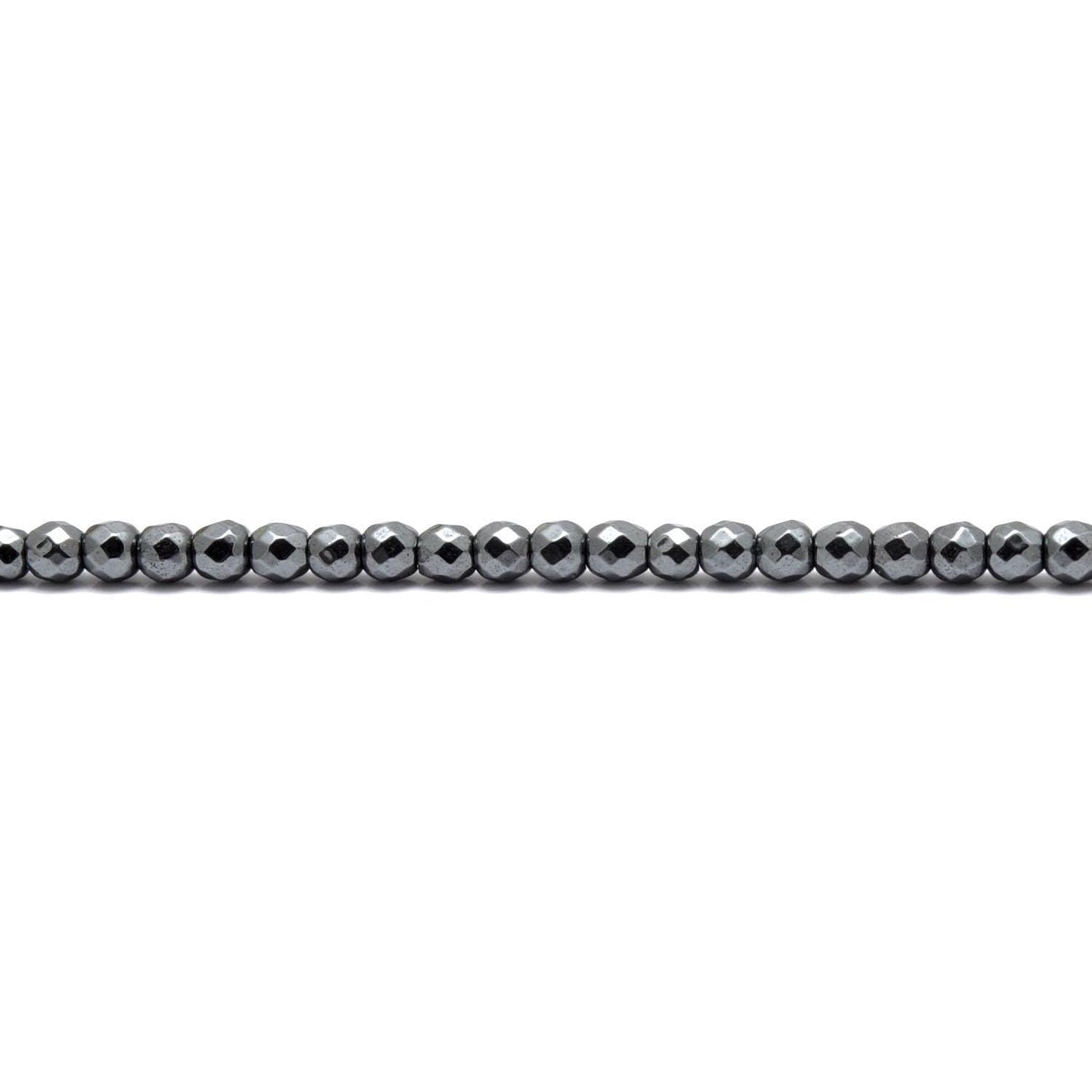 Hematite round faceted beads - scattered loose metallic view