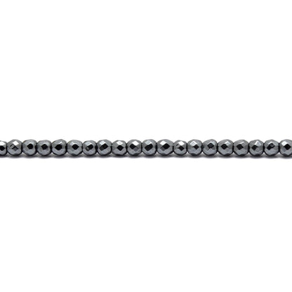 Hematite round faceted beads - scattered loose metallic view