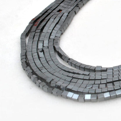 Hematite square beads 16 inch strand - front view geometric metallic