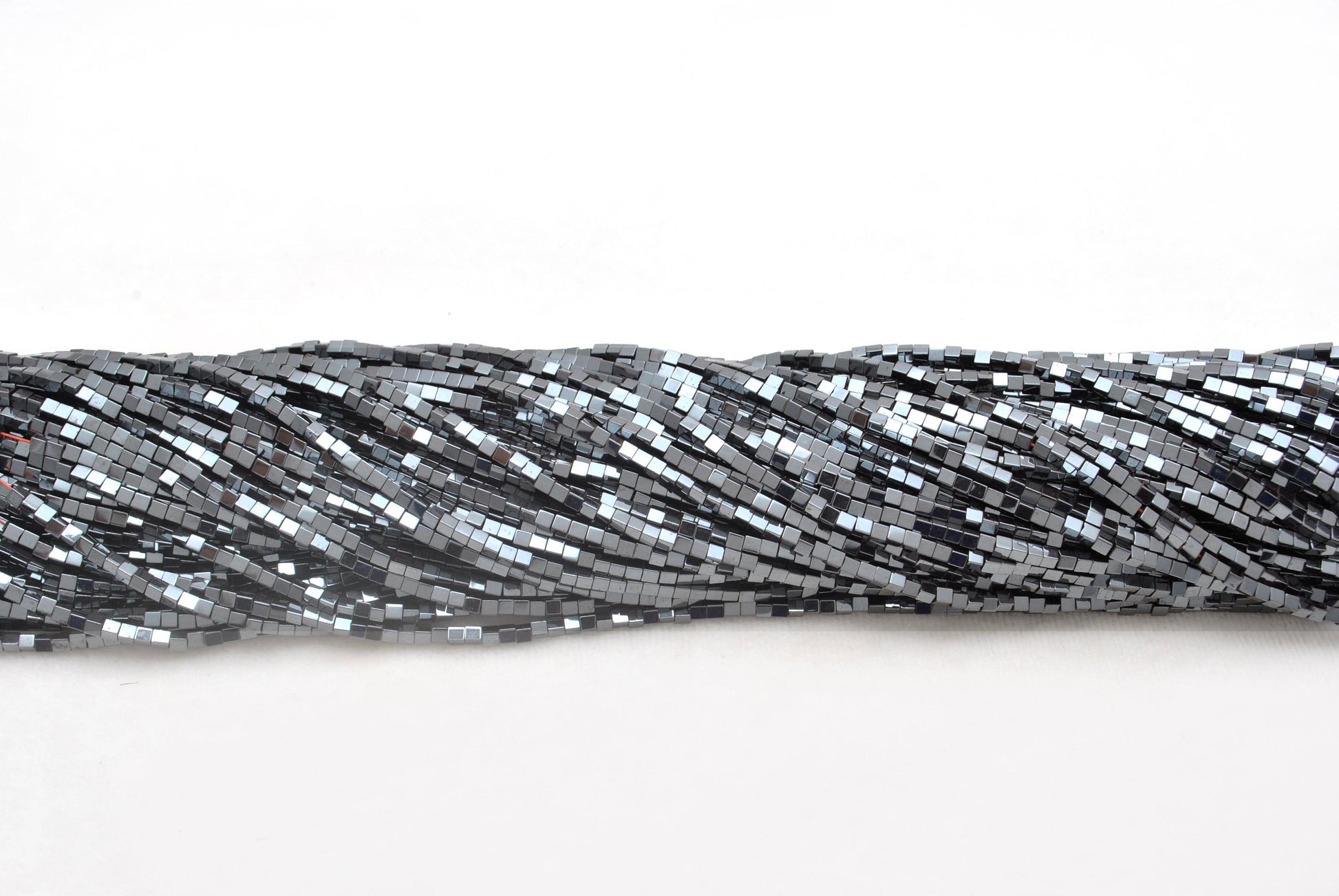 Hematite square beads for modern statement jewelry - scale reference