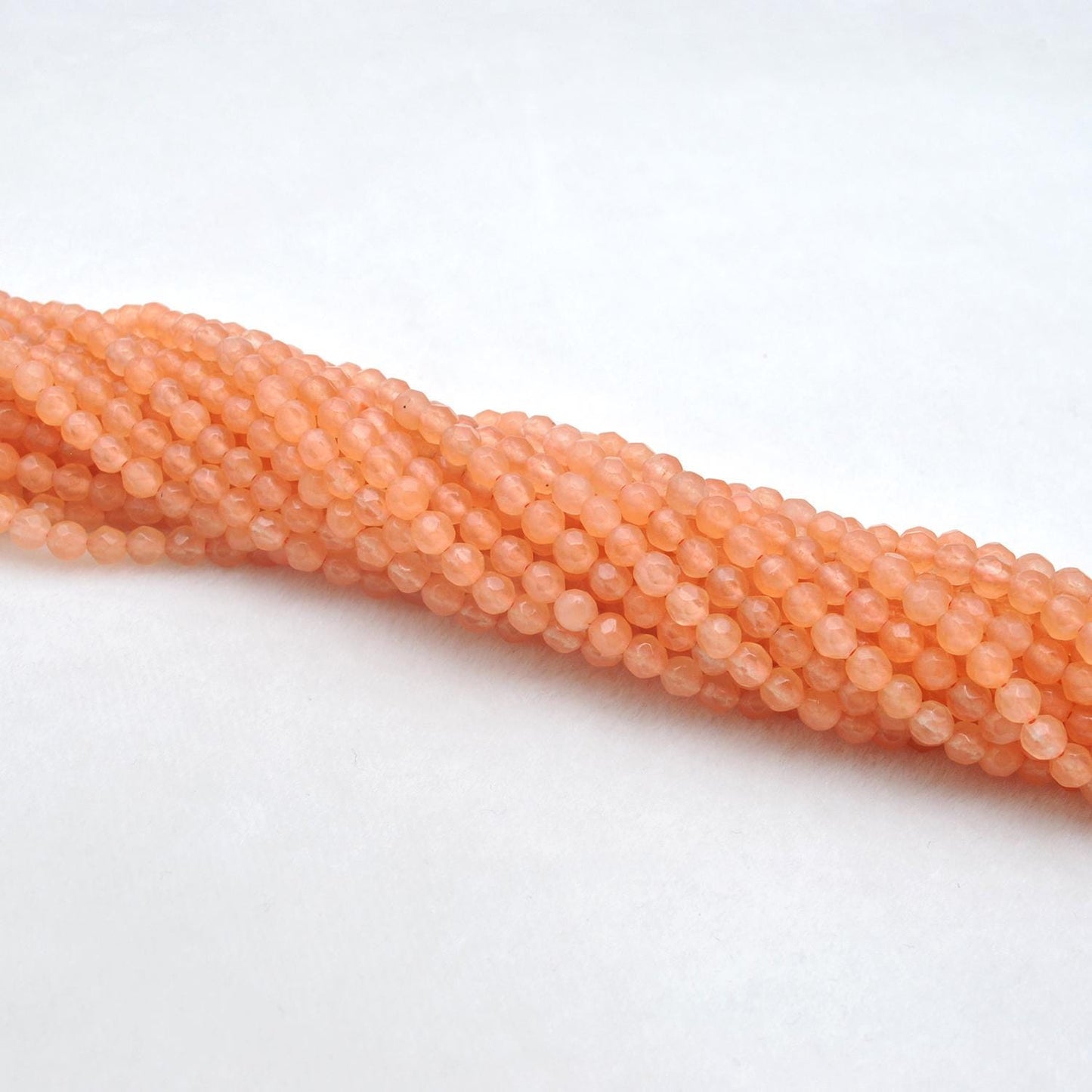 Honey quartz 4mm beads for stacking jewelry - scale reference