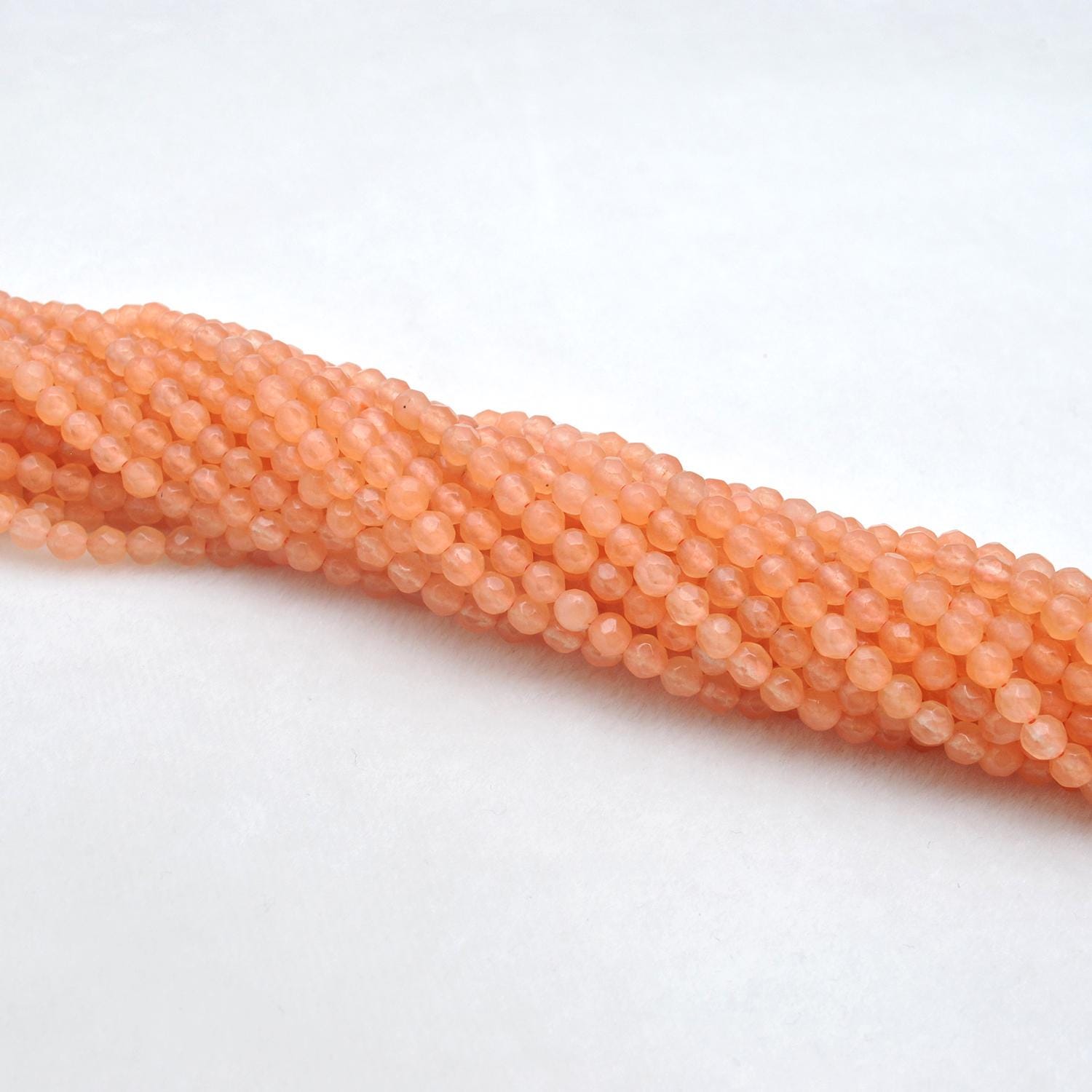 Honey quartz 4mm beads for stacking jewelry - scale reference