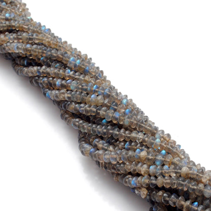 Labradorite button beads - close-up smooth flat disc flash