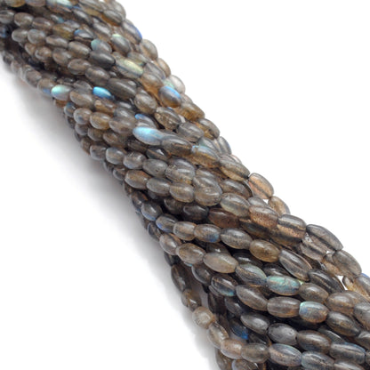 Labradorite drum beads - close-up colour flash cylindrical shape