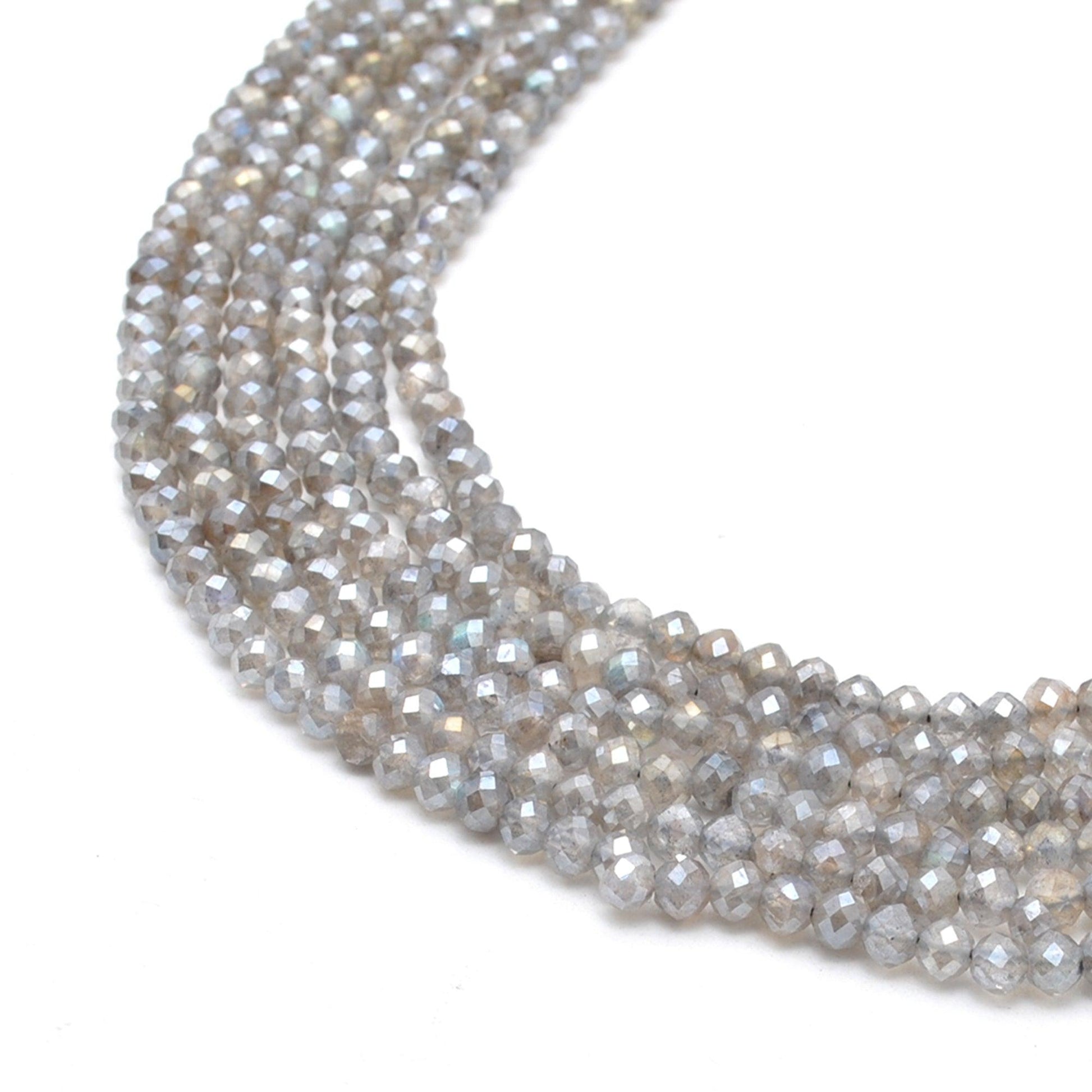 Labradorite faceted round beads - side profile blue green flash