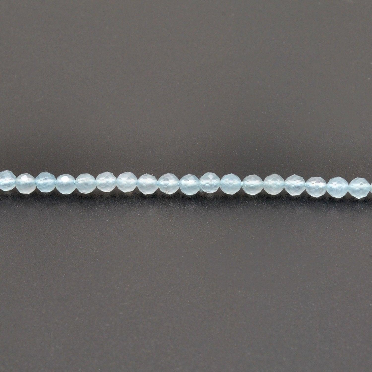 Light blue quartz beads for delicate jewelry - scale reference