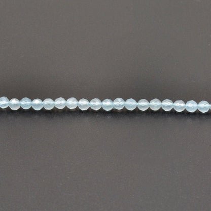 Light blue quartz beads for delicate jewelry - scale reference