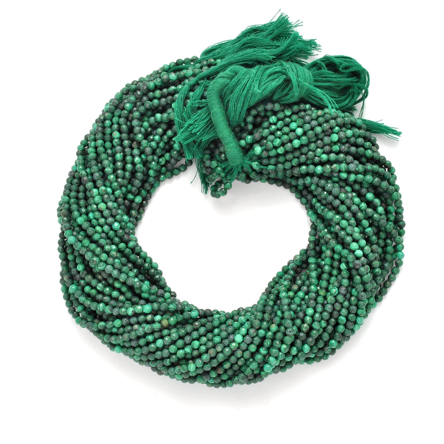 Malachite round faceted beads - close-up concentric green banding