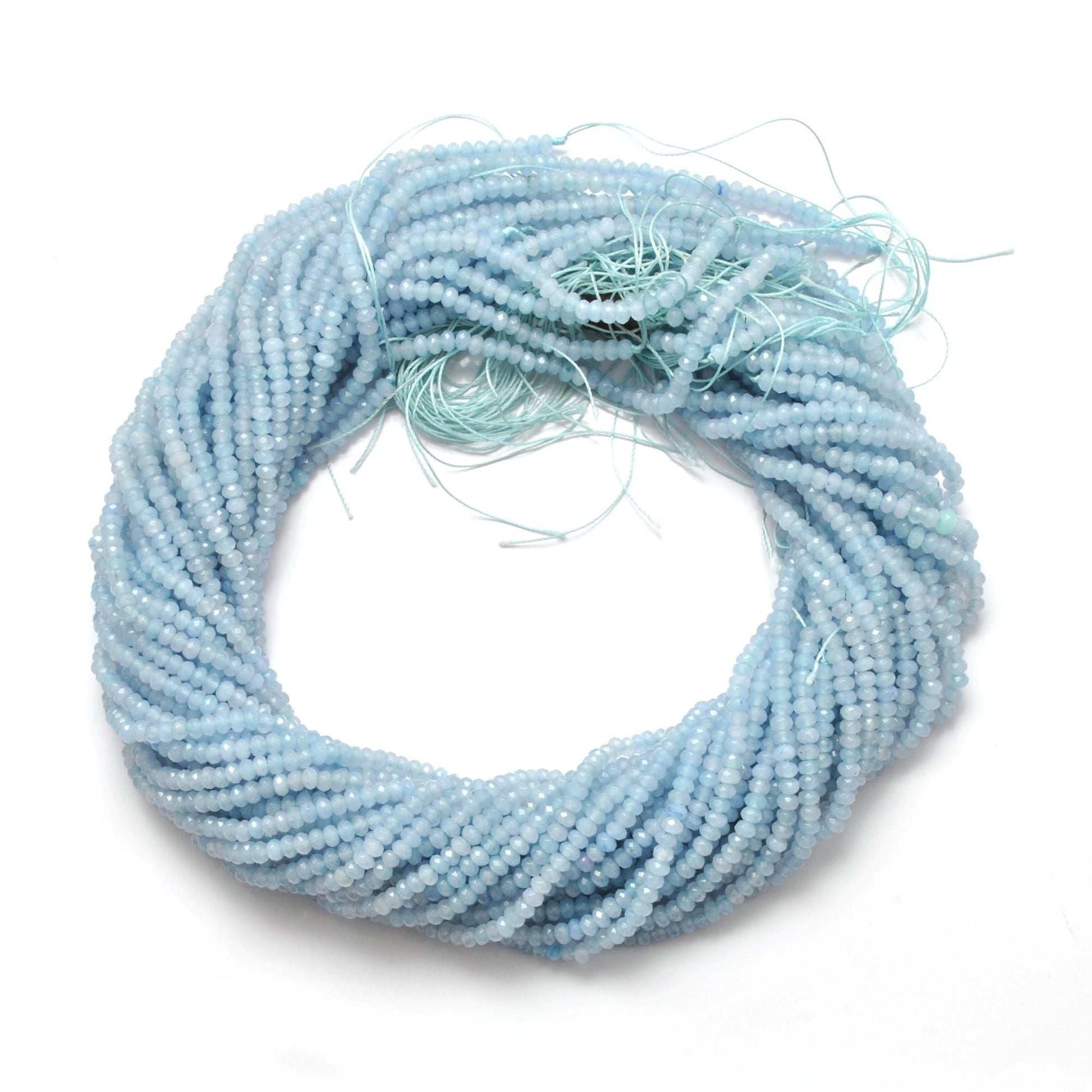Milky aqua quartz rondelle beads - close-up translucent aqua glow