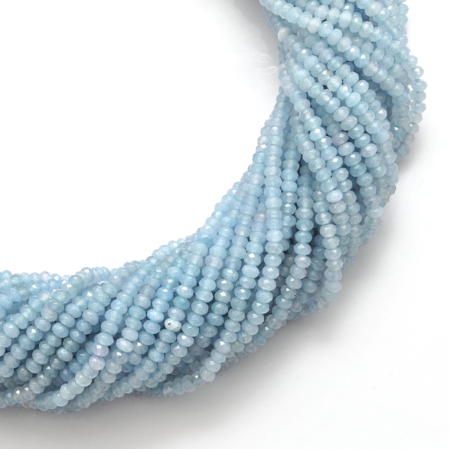 Milky aqua quartz rondelle strand - overhead flat lay dreamy