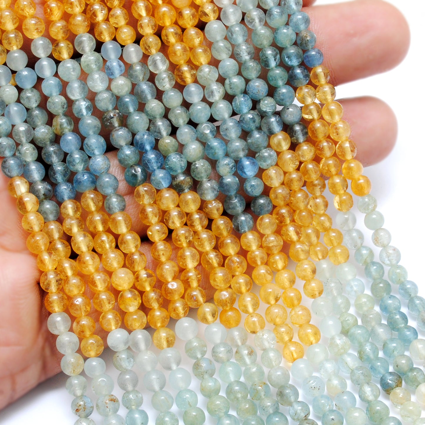 Multi aquamarine round beads wholesale - scale reference