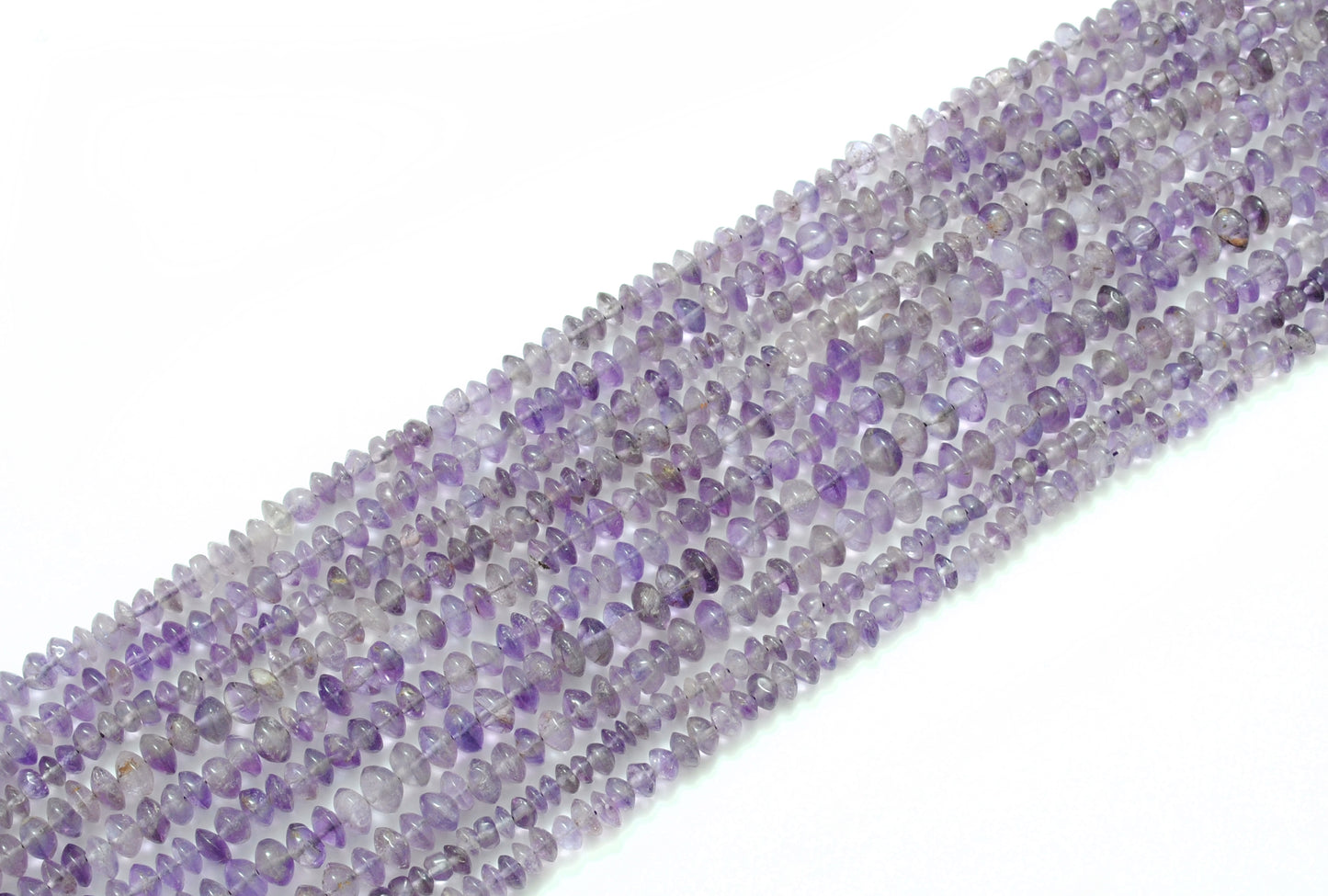 Natural amethyst button beads - scattered loose disc view