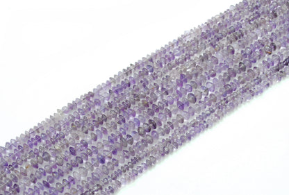 Natural amethyst button beads - scattered loose disc view