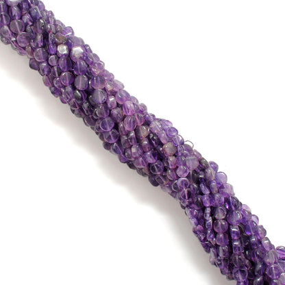 Natural amethyst coin beads 16 inch strand - overhead flat lay