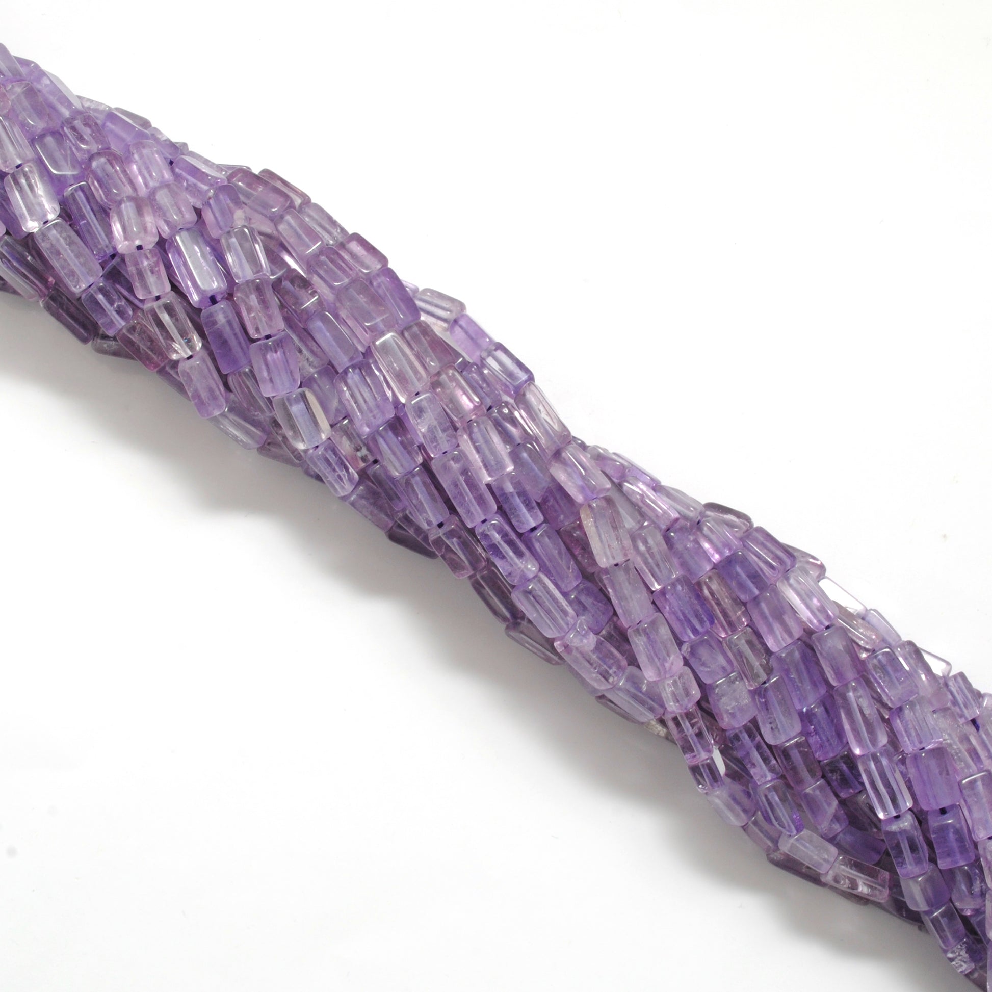Natural amethyst cube beads 15 inch strand - overhead flat lay graduated