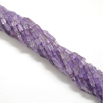 Natural amethyst cube beads 15 inch strand - overhead flat lay graduated