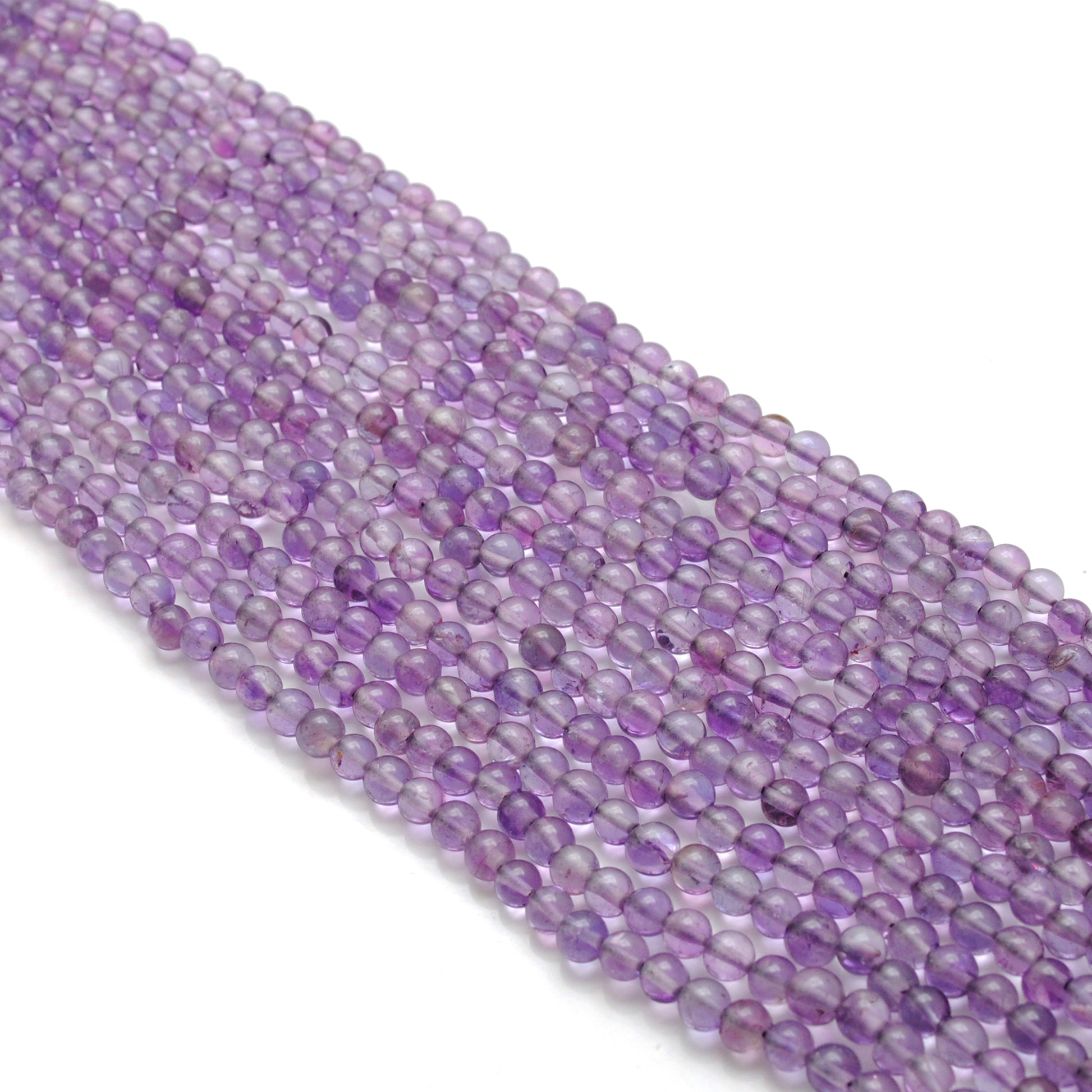 Natural amethyst tiny round beads 15 inch - overhead flat lay