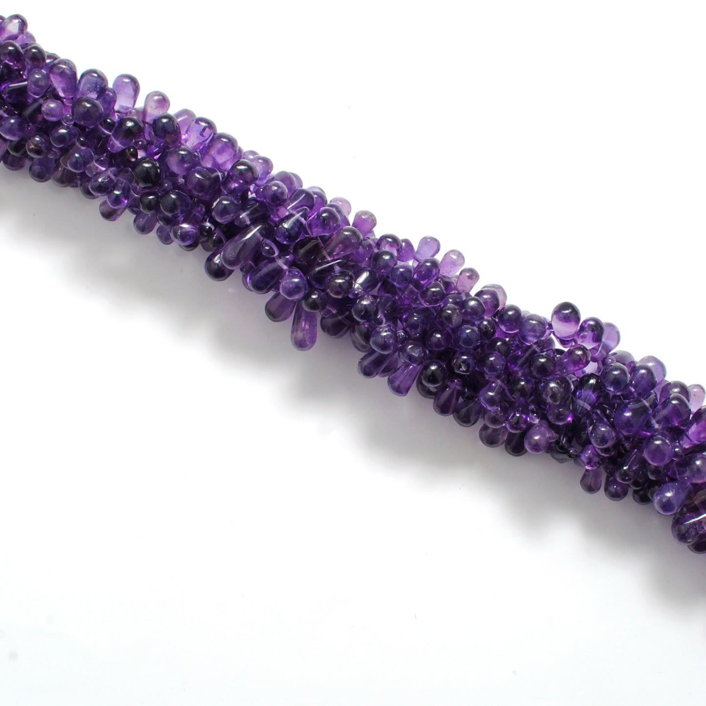 Natural amethyst drop beads 14 inch strand - overhead flat lay mixed