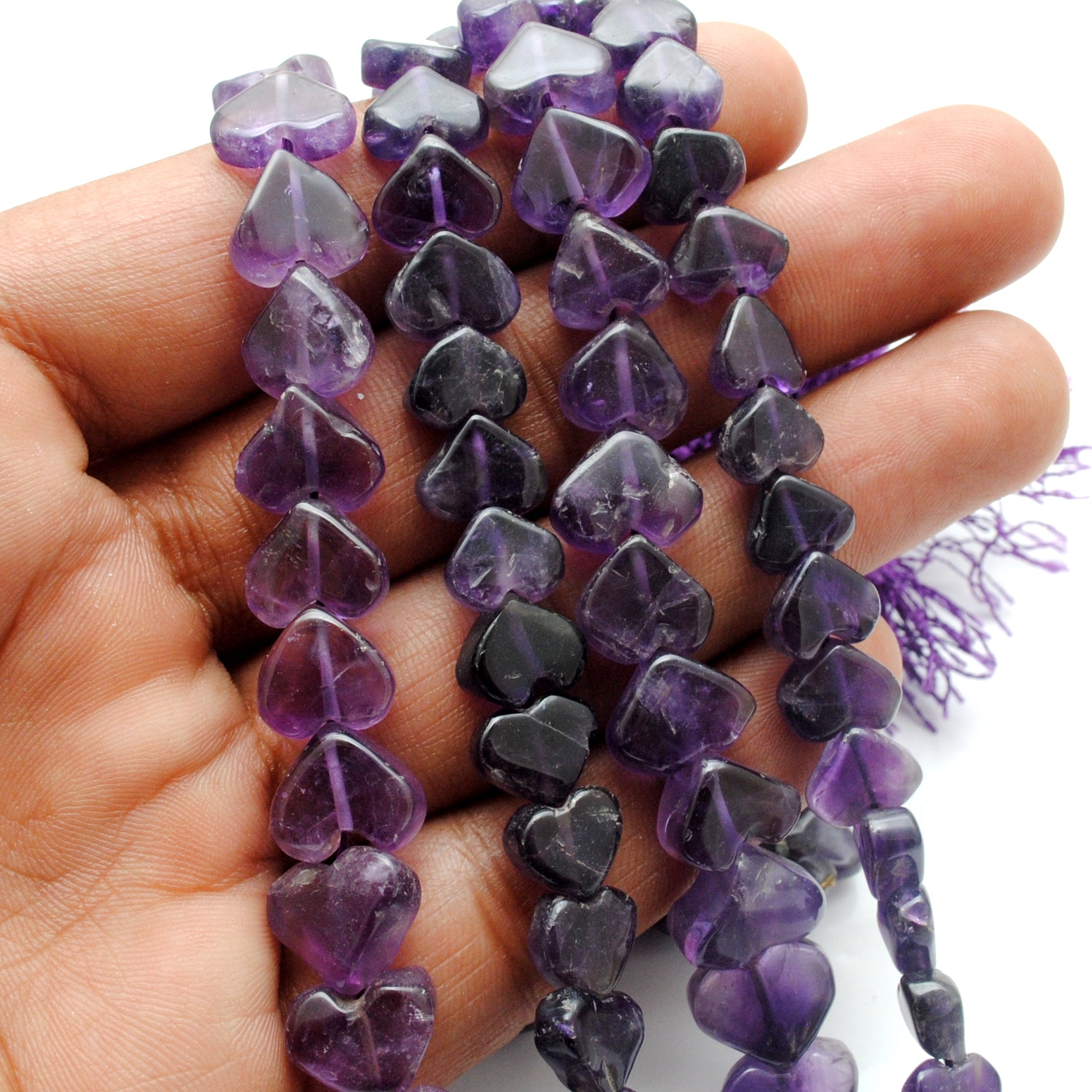 Natural amethyst heart beads 16 inch strand - overhead flat lay