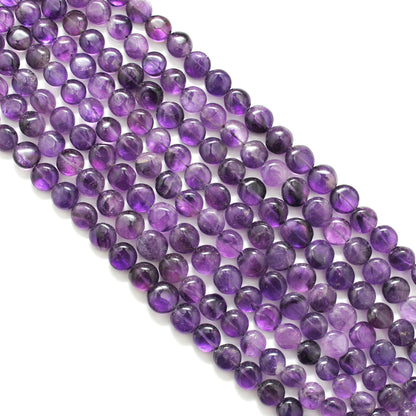 Natural amethyst large coin beads 16 inch strand - overhead flat lay
