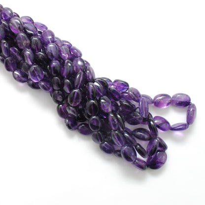Natural amethyst nugget beads 15 inch strand - overhead flat lay boho