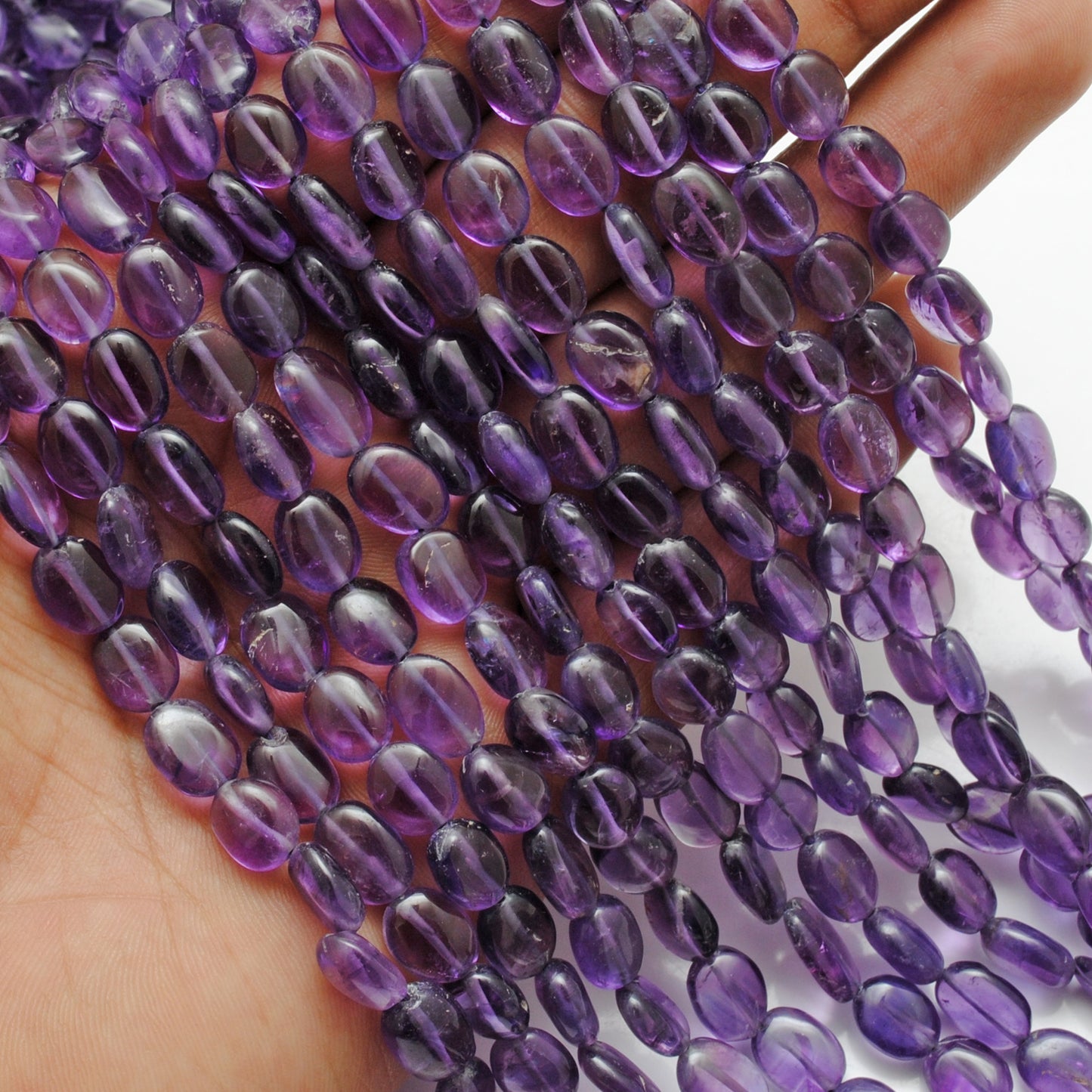 Natural amethyst oval beads 6x9mm wholesale - Jaipur quality
