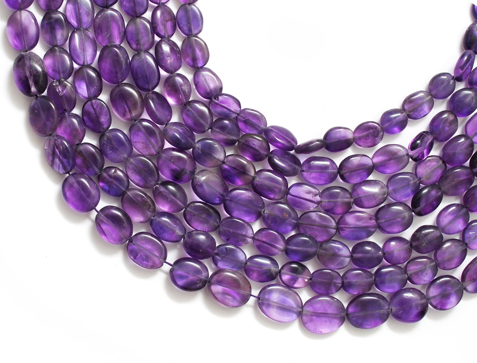 Natural amethyst oval beads 6x7-8x9mm mixed 15 inch strand - front