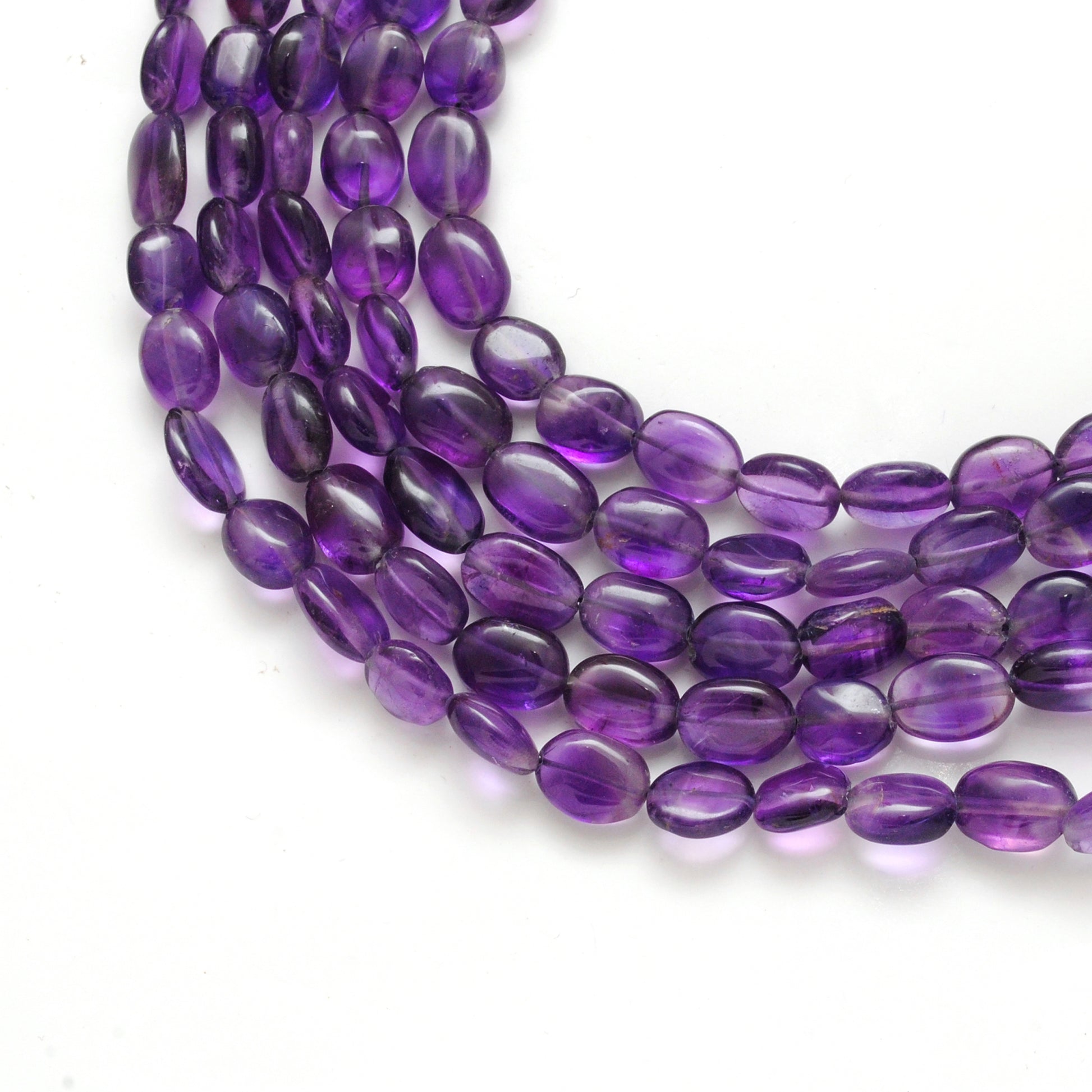 Natural amethyst oval beads 6x8-7x9mm 14 inch strand - front view