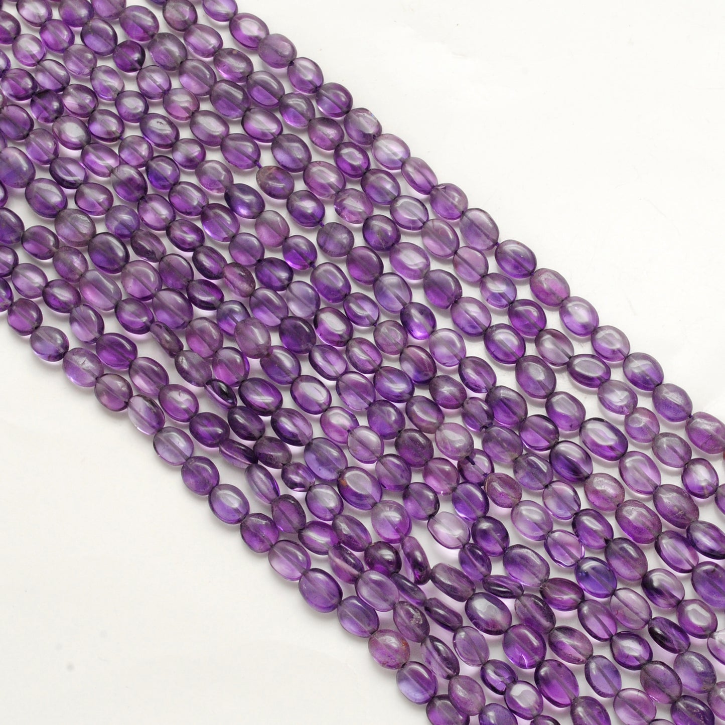 Natural amethyst oval beads wholesale strand - quality Jaipur