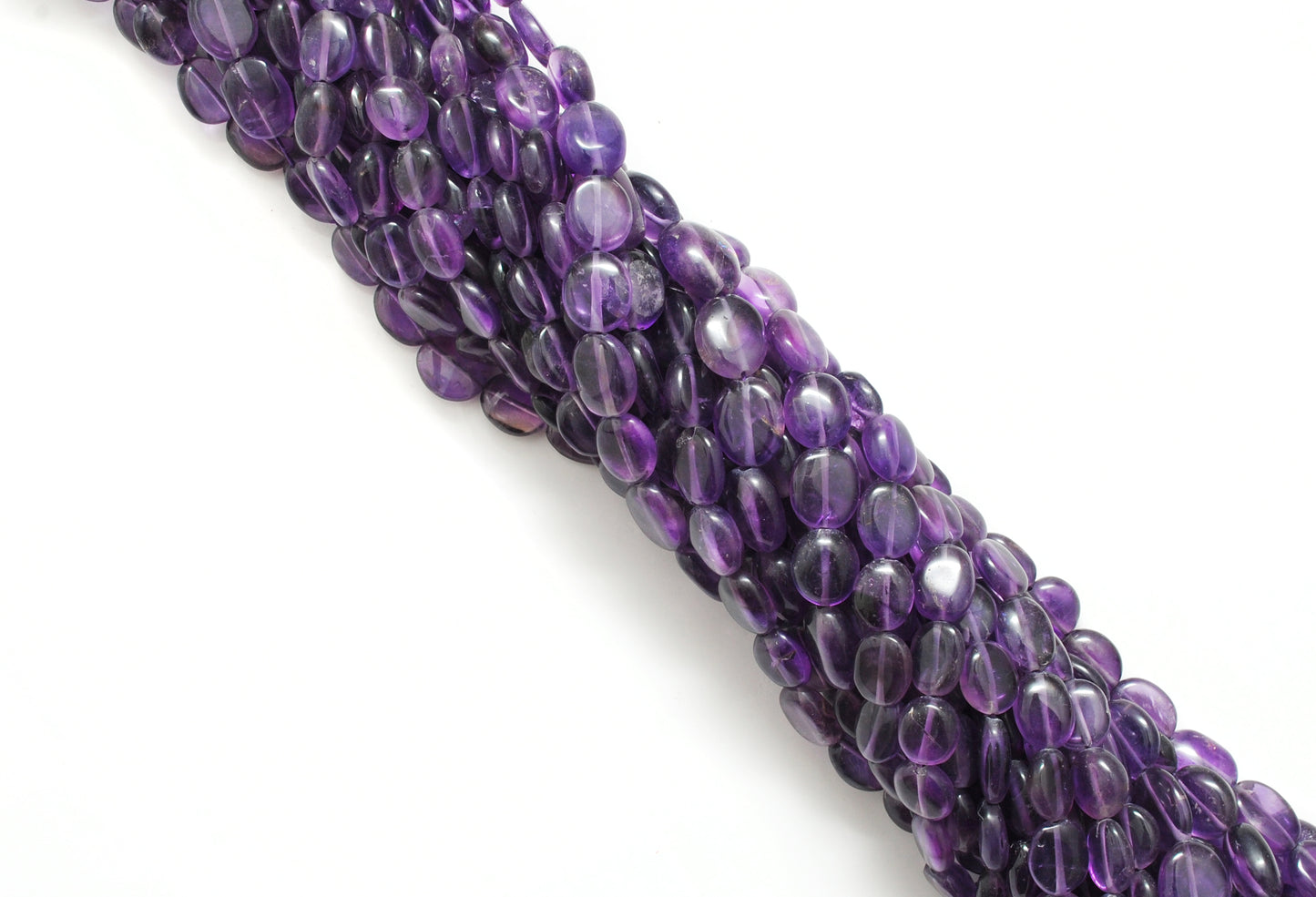 Natural amethyst mixed oval beads 15 inch - overhead flat lay