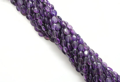 Natural amethyst mixed oval beads 15 inch - overhead flat lay