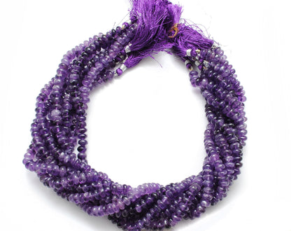 Natural amethyst rondelle beads 7-9mm strand - overhead flat lay