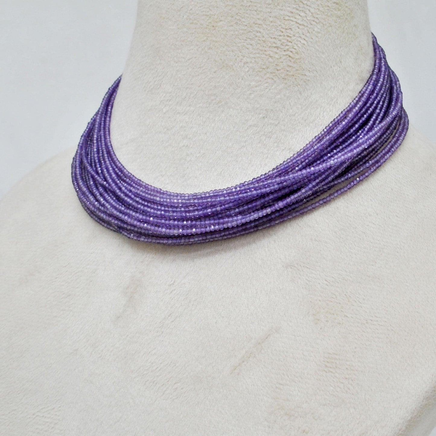 Natural purple amethyst rondelle beads - overhead flat lay deep