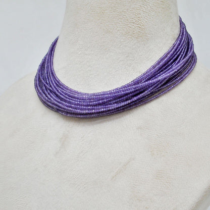 Natural purple amethyst rondelle beads - overhead flat lay deep