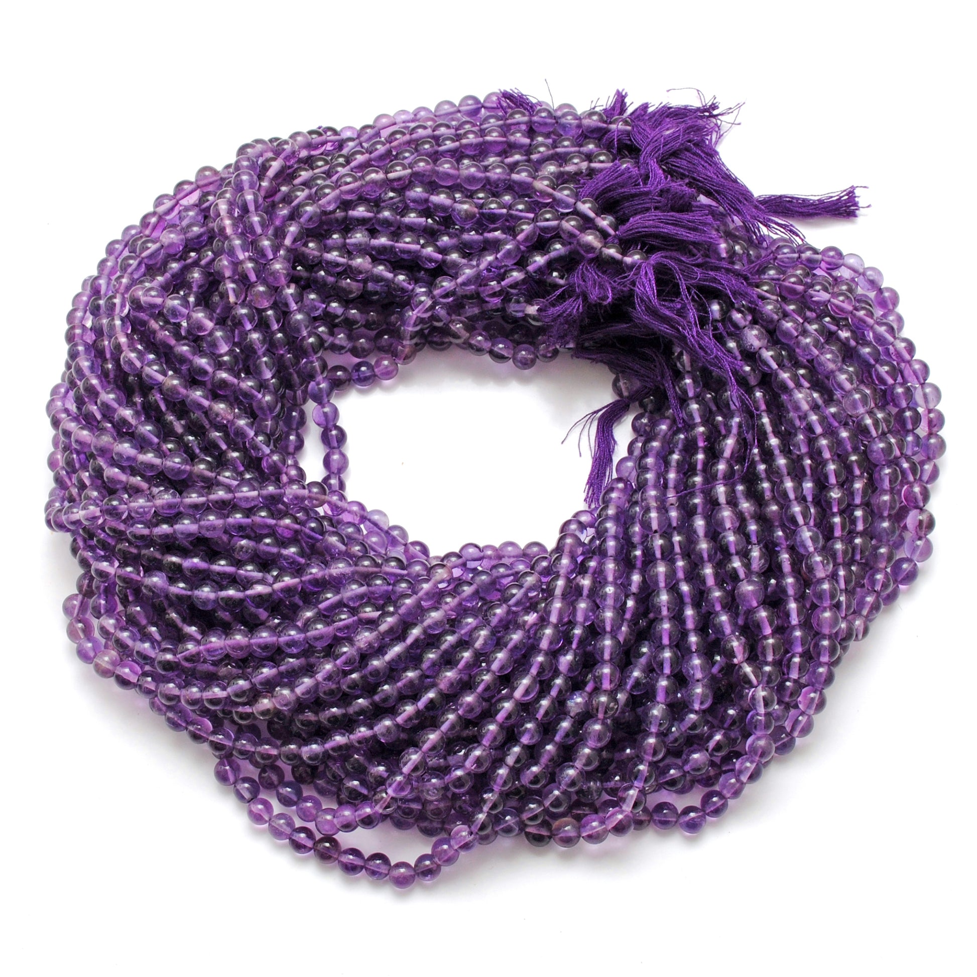 Natural amethyst 4-4.5mm round beads 15 inch - overhead flat lay