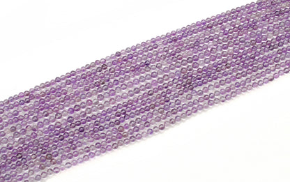 Natural amethyst smooth round beads - deep purple color view