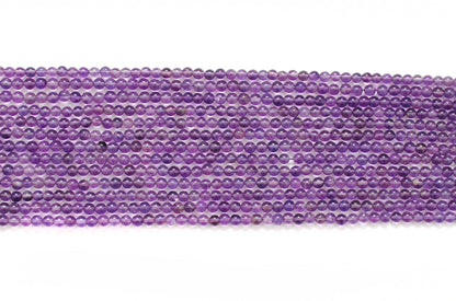 Natural amethyst 4mm smooth beads - scale reference