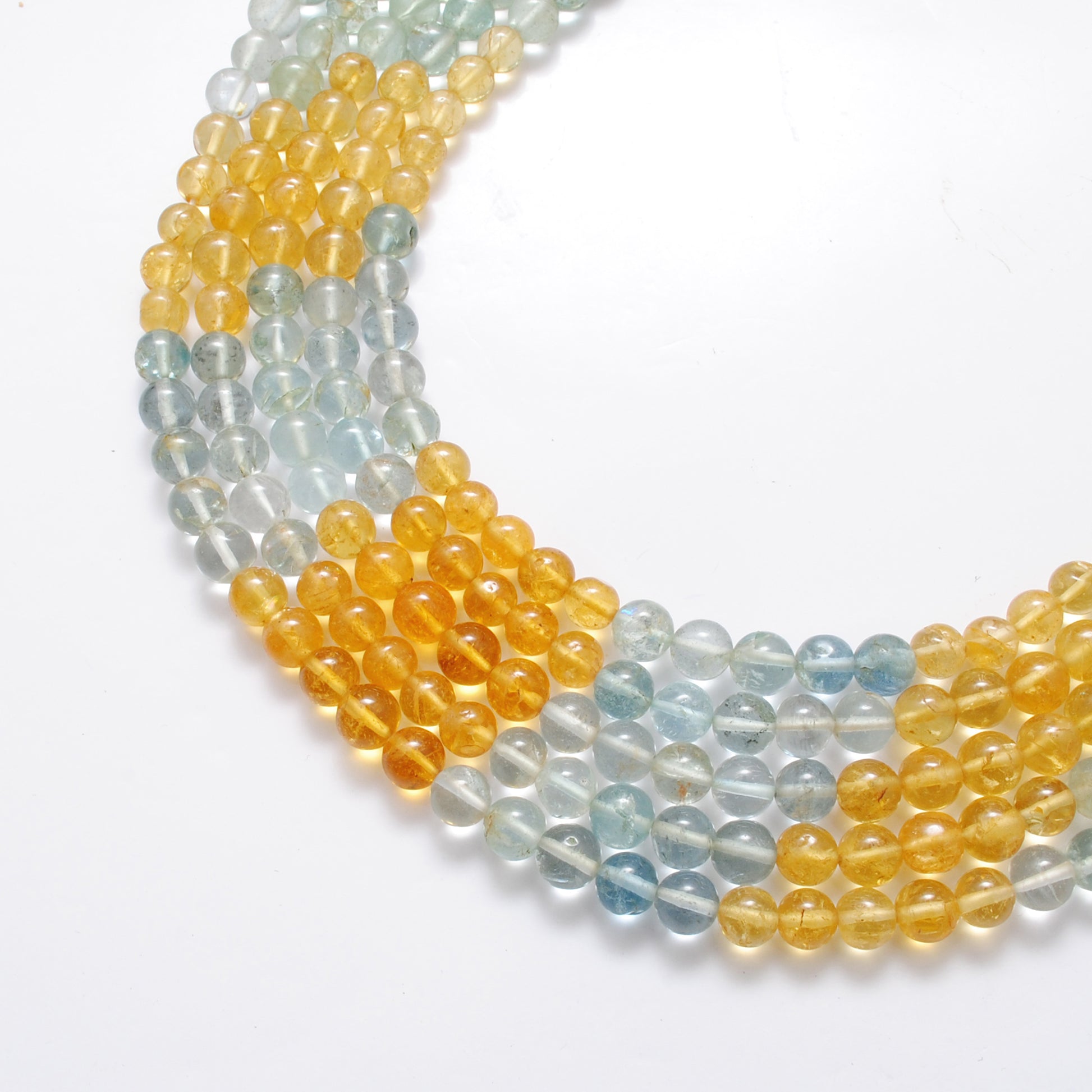 Natural aquamarine 6-7mm beads strand side profile
