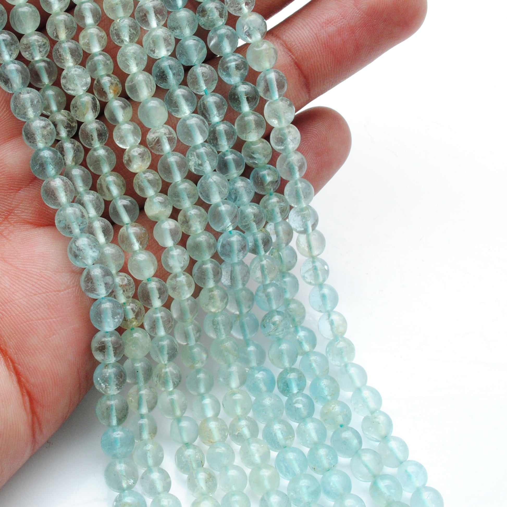 Natural aquamarine round beads strand side profile