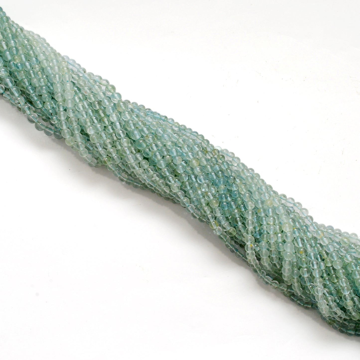 Natural aquamarine 4-5mm round beads 15 inch - overhead flat lay