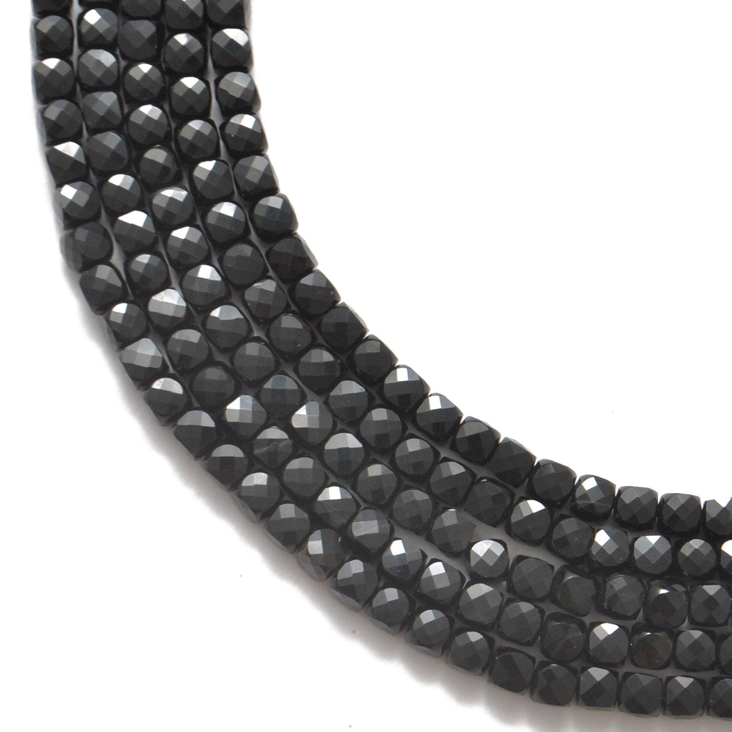 Natural black onyx faceted cube beads 4mm 12.5 inch strand - front
