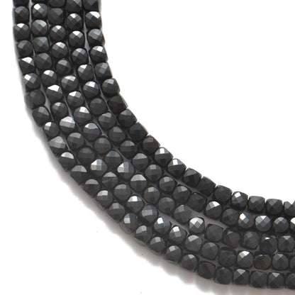Natural black onyx faceted cube beads 4mm 12.5 inch strand - front