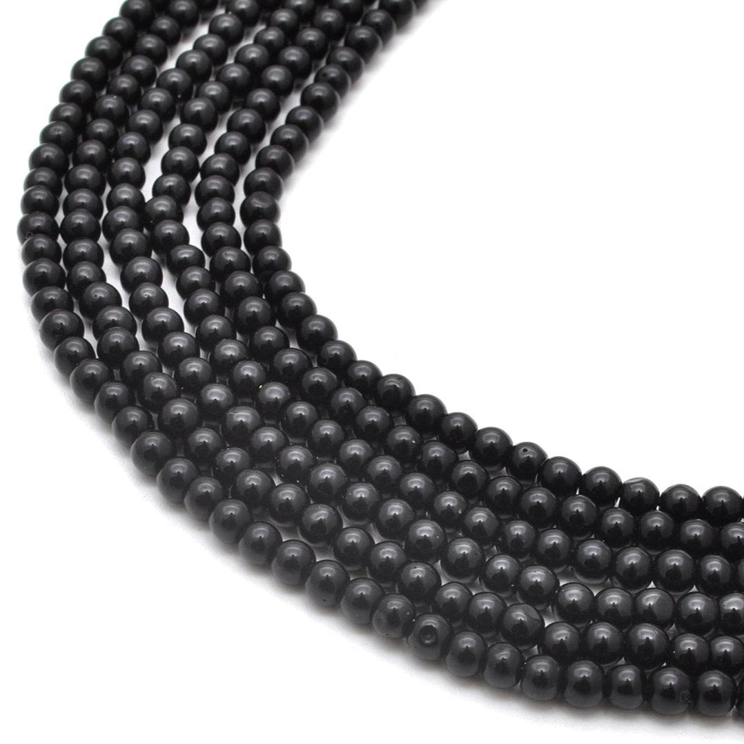 Natural black onyx plain round beads 12.5 inch strand - front view