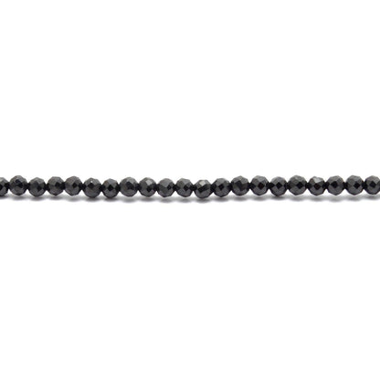 Natural black spinel beads scattered loose - premium quality