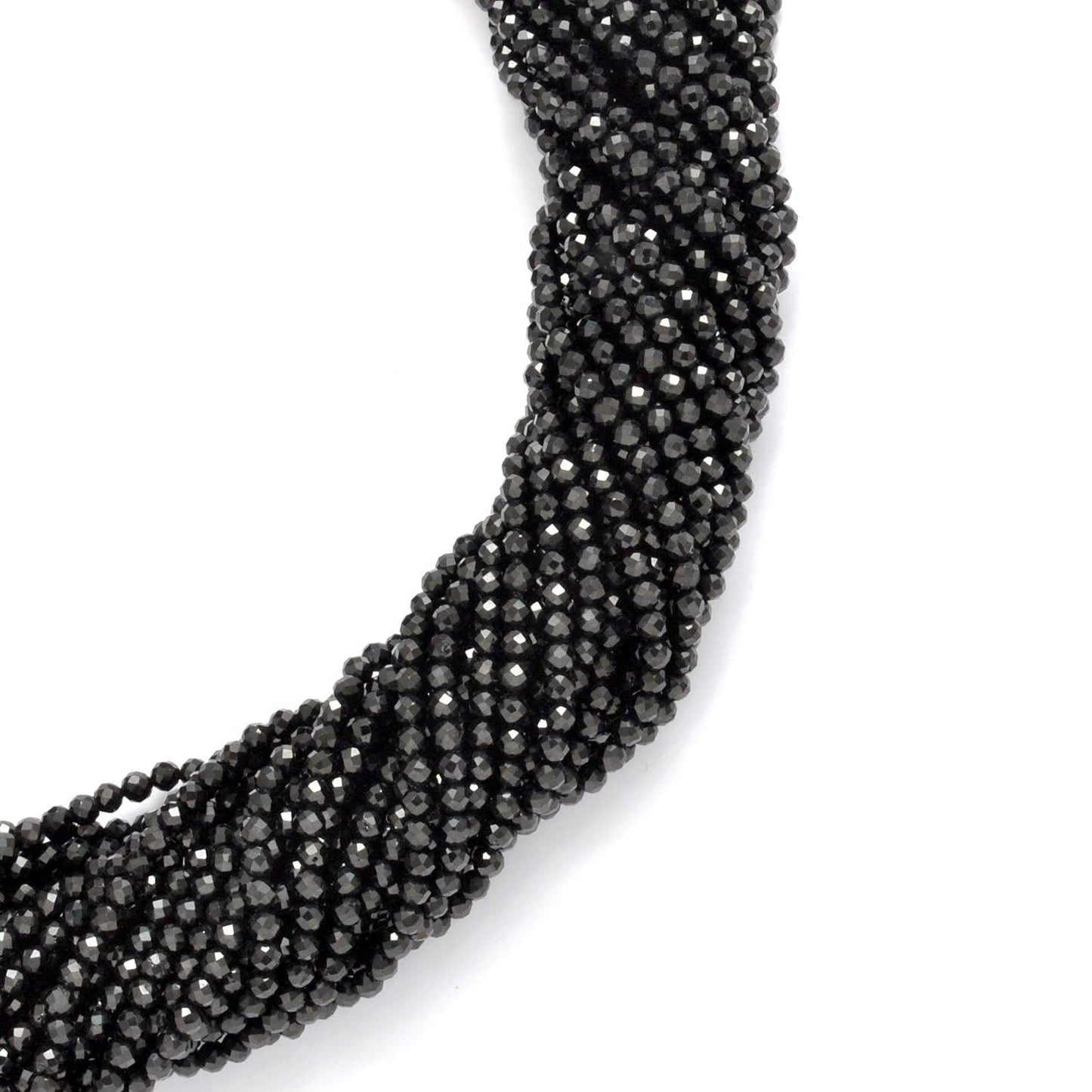 Natural black spinel round beads - overhead flat lay dark