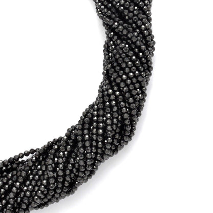 Natural black spinel round beads - overhead flat lay dark