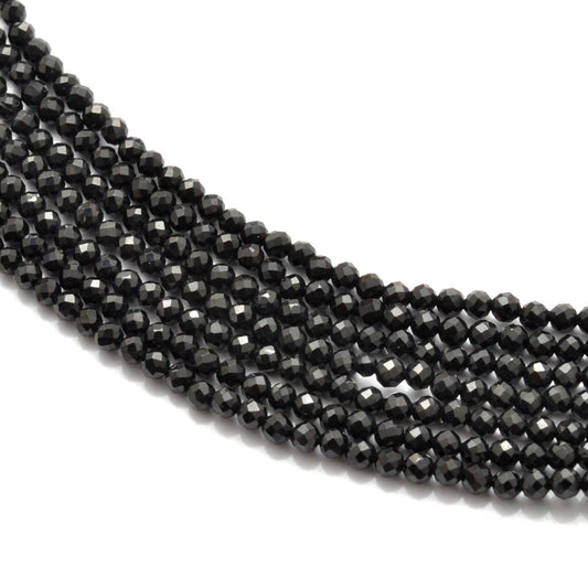 Natural black spinel round faceted beads strand - front view jet black