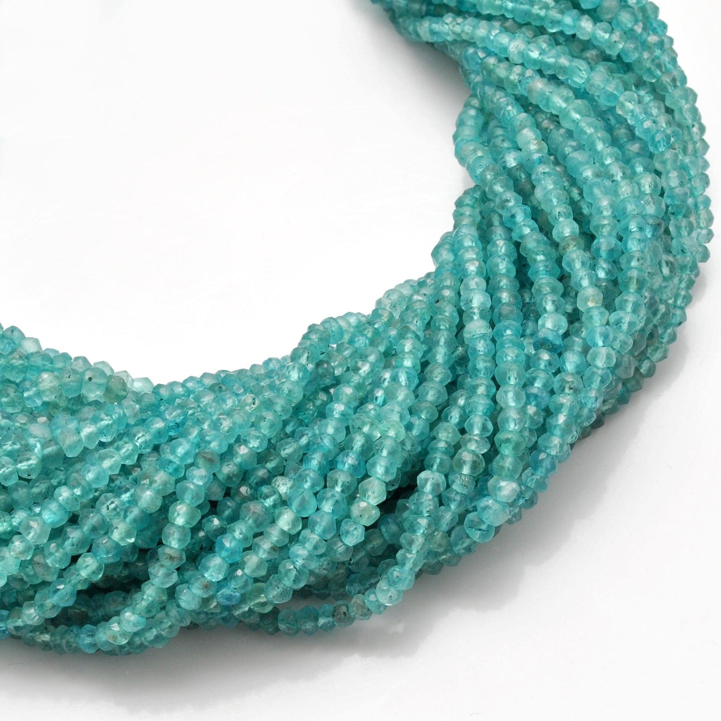 Natural blue apatite rondelle beads 13 inch - overhead flat lay
